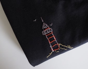 Hand embroidered T-Shirt with a lighthouse