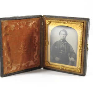 Antique Daguerreotype / Ambrotype Photograph Portrait of a Young Victorian Gentleman Bordered by a Gold Frame in a Leather Case