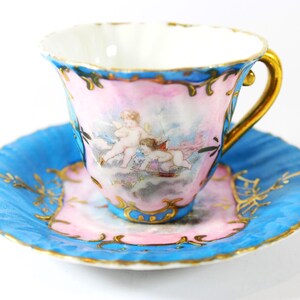 Antique Cupid Small Hand Painted Cup and Saucer &#39;L R Austria&#39; / Antique Austrian