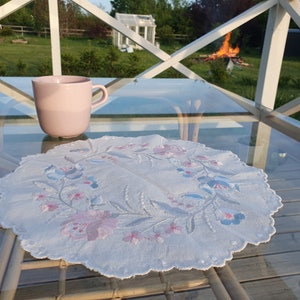 Round white table cloth with flower embroidery
