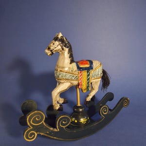 Handmade wooden rocking horse figurine