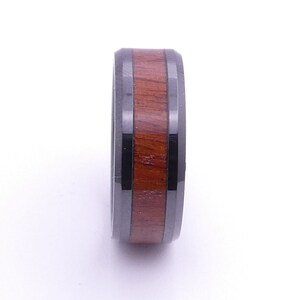 Black ceramic ring with mahogany inlay