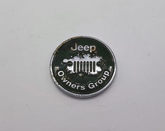 Vintage-Metallabzeichen „Jeep Owners Group“.