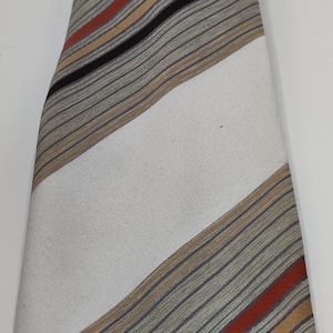Vintage tie by Marc Lery, 100% washable polyester. Beige, blue, orange.