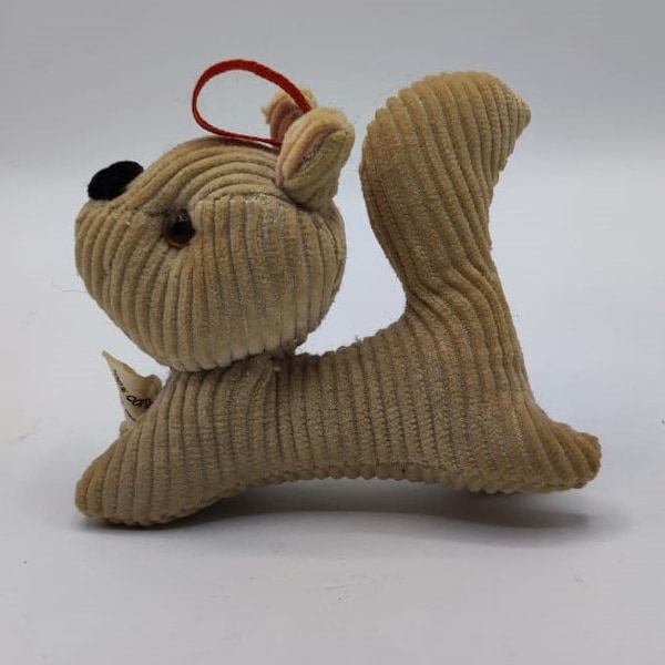 Petite peluche vintage d'un chien