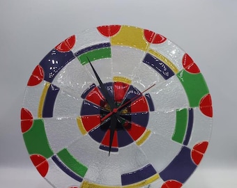 U.T.S Quartz colorful clock made in Germany. Works.