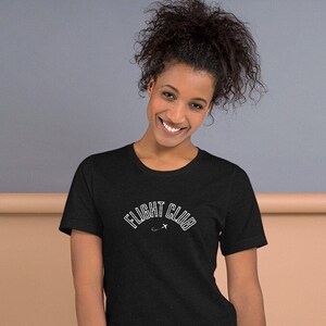 Flight Club Unisex T-Shirt with Plane Tick Design