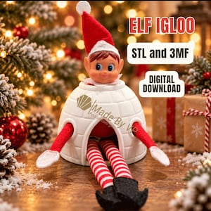 May include: A white igloo-shaped structure with a red and white elf doll emerging from the top and front opening. The elf wears a red hat and red and white striped leggings. Text on the image reads ELF IGLOO, STL and 3MF, and DIGITAL DOWNLOAD.
