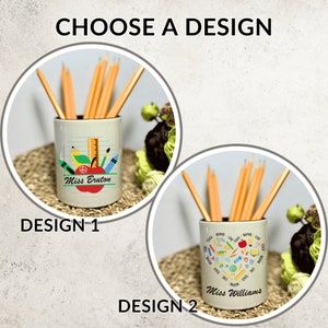 May include: Two ceramic pencil pots with different designs, each filled with pencils. Design 1 features an apple, ruler, and the text "Miss Bruton." Design 2 has a heart shape with school supplies and the text "Miss Williams."
