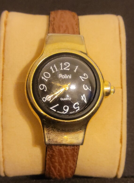 Vintage Polini Ladies Watch. Gold with Black face.