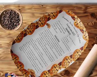 May include: A white oval serving platter with a recipe for Grandma's Butter Chocolate Chip Cookies printed on it. The platter is decorated with images of chocolate chip cookies.