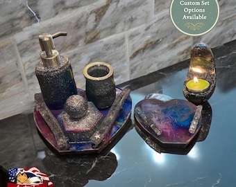 Galaxy space themed vanity tray set soap dispenser toothbrush holder. Cotton ball jar with 2 matching heart perfume trays with handles.