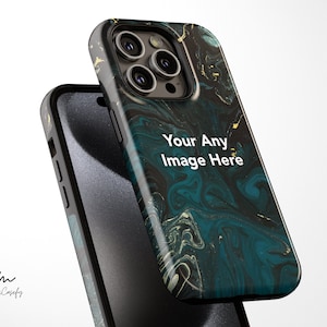 May include: A black phone case with a green and gold marble design. The case has a cutout for the camera lens and the text "Your Any Image Here" is printed on the back.