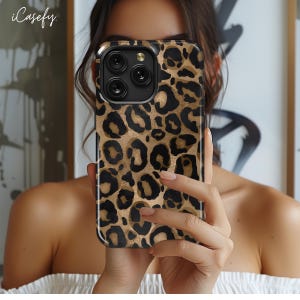 May include: A black and gold leopard print phone case with a camera lens cutout. The case is made of a hard plastic material and has a glossy finish.