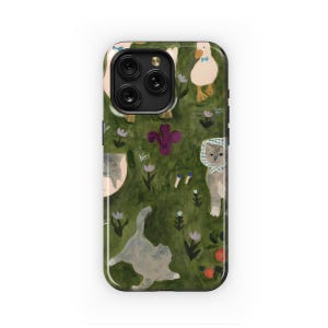 May include: A green phone case with a repeating pattern of cats and a goose. The cats are gray and white, and the goose is white with a blue collar. The background is a green field with flowers and mushrooms.