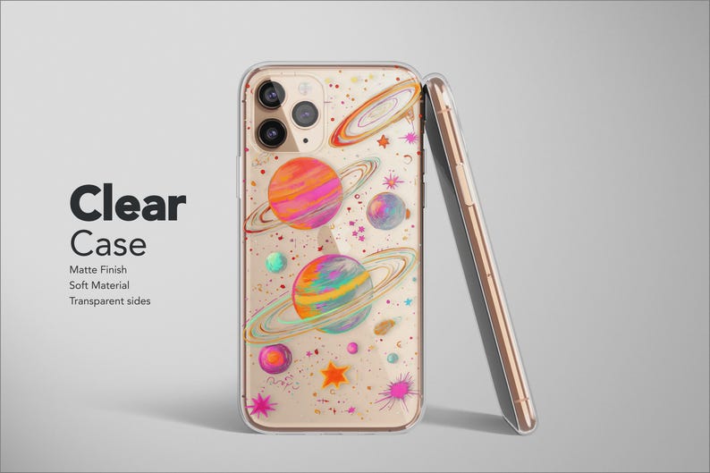 May include: Clear phone case with a colorful planet design. The case features planets with rings, stars, and colorful splashes. The phone case is made of soft material with transparent sides. The text "Clear Case" is displayed.