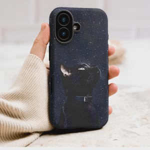 May include: A black phone case featuring a black cat looking upwards against a starry night sky. The case has a dark blue background with white stars and a black cat with a blue collar.