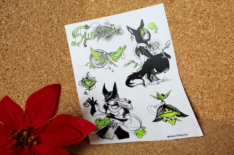 May include: A sheet of black and white illustrations with green accents. The illustrations include a wolf-like creature, a fairy, a heart, and a plant. The text "Sunfire" is at the top of the sheet. The text "@mootdesign" is at the bottom of the sheet.