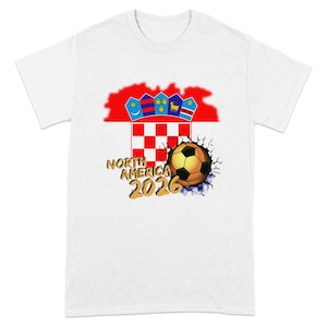 White t-shirt with Croatia flag, soccer ball, and "North America 2026" text.