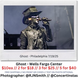 May include: A live performance photo of a musician in a black outfit, hat, and face paint, holding a microphone. The image is a polaroid with text that reads "Ghost - Philadelphia 7/19/25" and "Ghost - Wells Fargo Center". Photographer: @RJNSmith // @ConcertInstas.