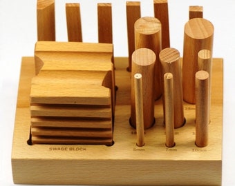 18 PC. SE Swage Block and Punch Set on Wooden Base 