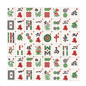 May include: A collection of white rectangular Mahjong tiles arranged in a grid, featuring various engraved symbols, Chinese characters, and small red, green, and black numbers or letters in the corners of each individual tile piece.