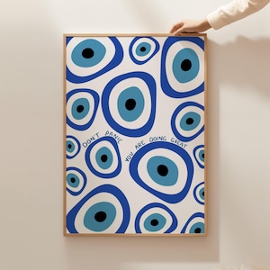 May include: A white background with a repeating pattern of blue and white evil eyes. The text "Don't Panic You Are Doing Great" is written in blue on the white background.