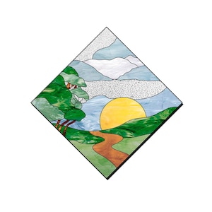 May include: A stained glass window design featuring a sun setting behind a green hill with a winding path leading to a tree with green leaves. The sky is blue with white clouds.