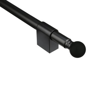 May include: A black curtain rod with a round finial. The rod is mounted on a square bracket. The finial is a solid, round shape. The rod is a simple, modern design.