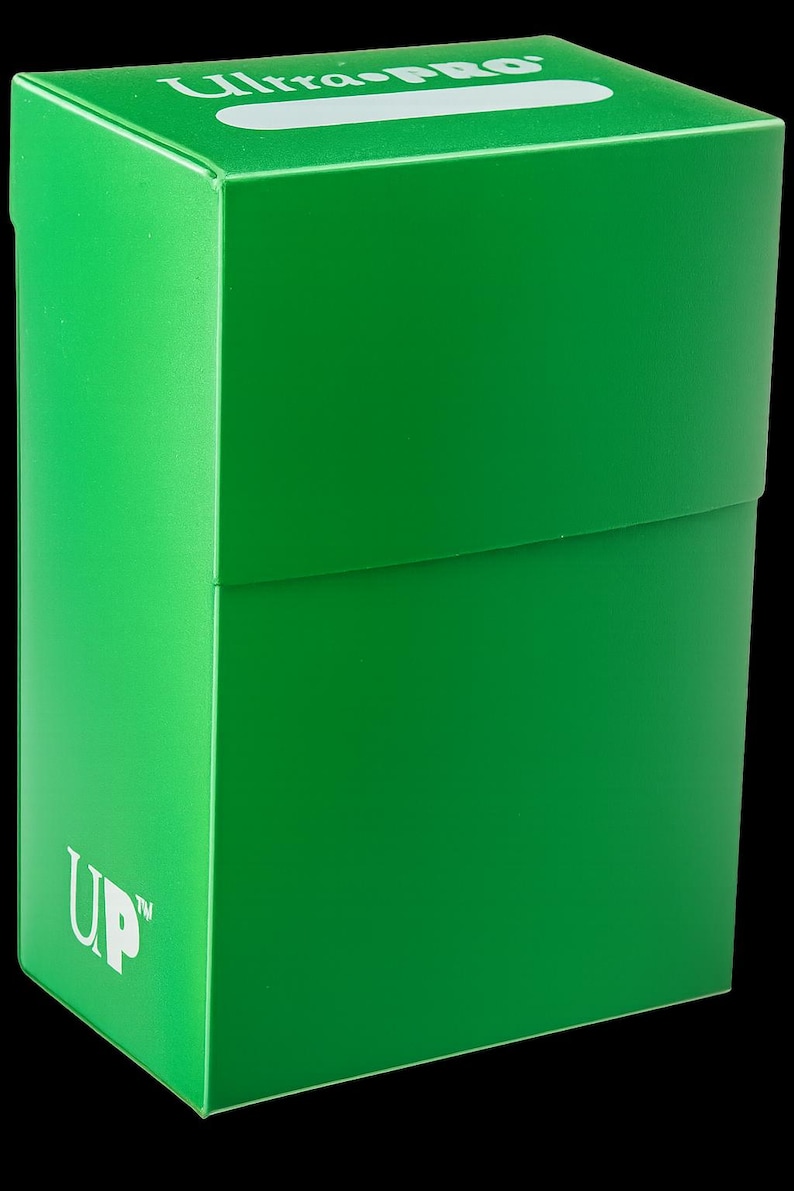 May include: A bright green card storage box with the text "Ultra PRO" in white on the top and "UP" on the side. The box is rectangular with a lid and is set against a black background.