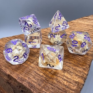 Purple ink wheat polyhedral dice for RPG games and Dungeons and Dragons Adventures