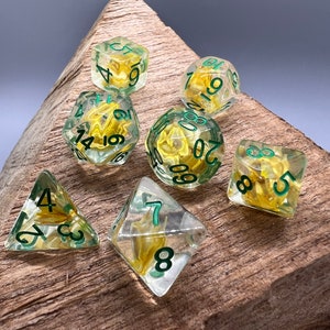 Yellow wheat grass polyhedral dice for RPG games and Dungeons and Dragons Adventures