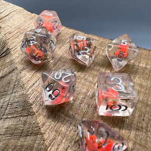 Lavender orange flower Crystal Core polyhedral dice for RPG games and Dungeons and Dragons Adventures