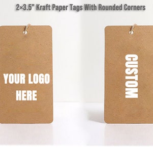 May include: Two brown kraft paper tags with rounded corners and white text. The tag on the left says "YOUR LOGO HERE". The tag on the right says "CUSTOM".