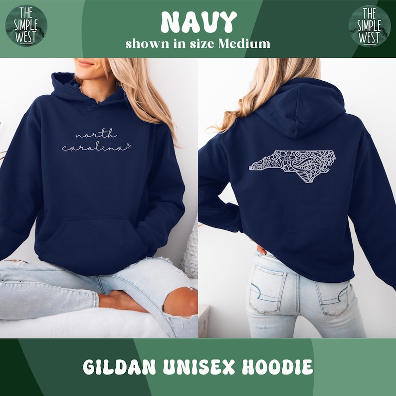 May include: Navy blue Gildan unisex hoodie with the text "north carolina" in cursive on the front. The back of the hoodie features a white, detailed outline of North Carolina. The Simple West logo is visible.