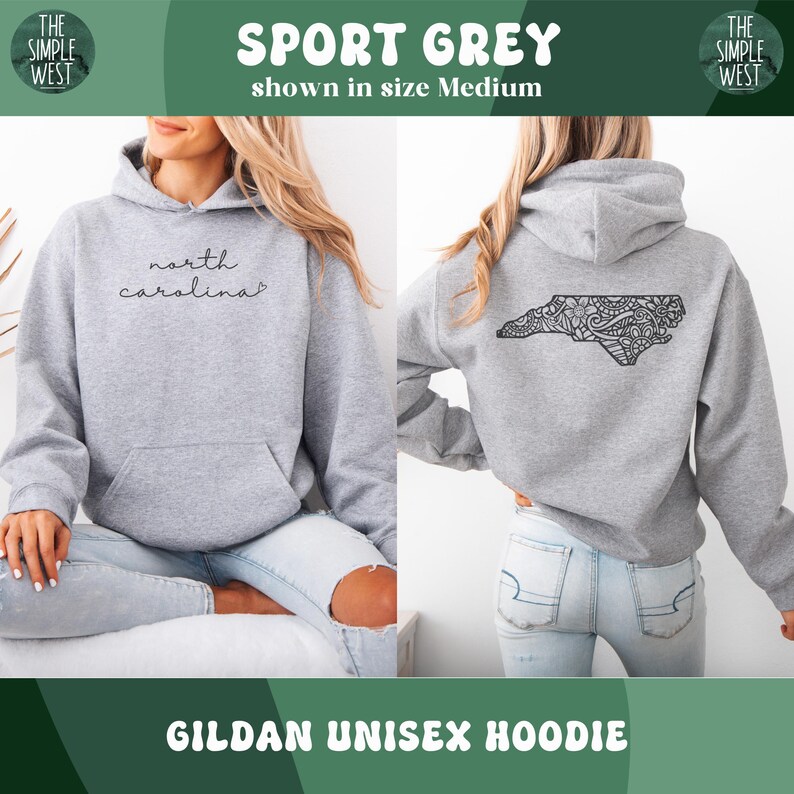 May include: Sport Grey Gildan unisex hoodie. The front features the text "north carolina" in a script font. The back displays a black, detailed outline of North Carolina. The hoodie is shown in size Medium.
