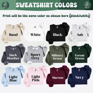 a bunch of sweaters that are all different colors