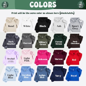 Op de afbeelding: Een kleurenkaart toont hoodies in verschillende kleuren: Zand, Wit, Zwart, As, Sportgrijs, Donkergrijs, Houtskool, Militair groen, Bosgroen, Donkere chocolade, Orchidee, Lichtroze, Heliconia, Kastanjebruin, Rood, Lichtblauw, Carolina blauw, Indigoblauw, Marine en Koningsblauw.