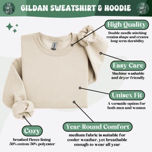 May include: Cream-colored Gildan sweatshirt with the text "Gildan Sweatshirt & Hoodie". Features include high quality, easy care, unisex fit, cozy brushed fleece lining, and year-round comfort. Made with 50% cotton and 50% polyester.