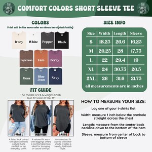 May include: Image of a Comfort Colors short sleeve tee shirt with color swatches in ivory, white, pepper, black, espresso, yam, berry, moss, blue jean, and navy. Size info includes width, length, and sleeve measurements in inches. A fit guide is also included.