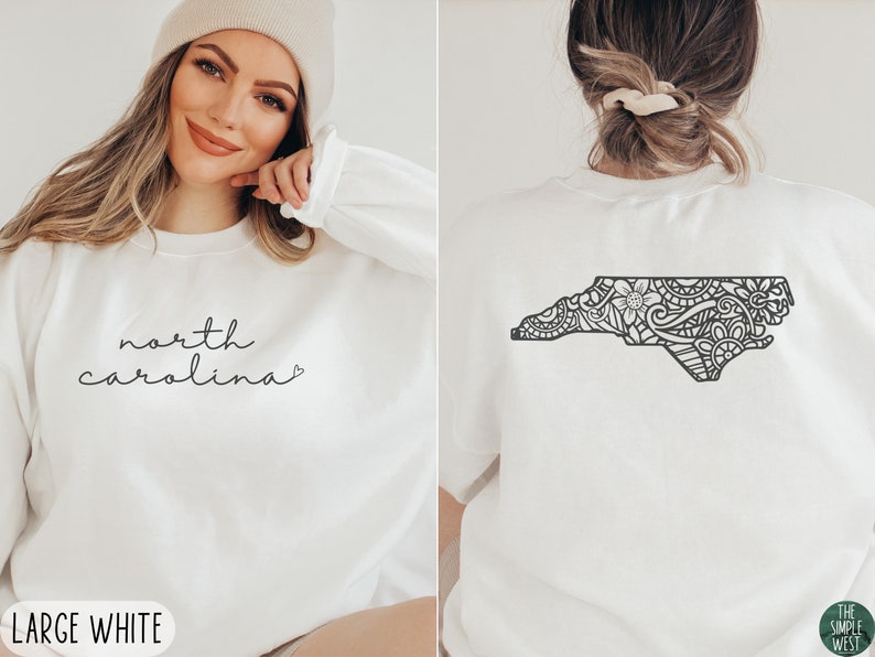May include: White sweatshirt with the text "north carolina" on the front and a black and white outline of the state of North Carolina on the back.