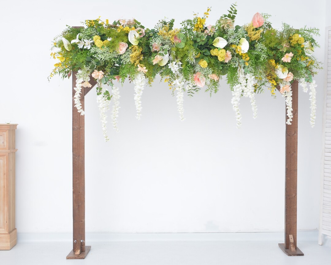 Lush Greenery Wedding Arch Arrangement With Champagne Yellow and