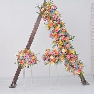 Wildflower Wedding Arbor Arrangements  with a Splash of Hot Pink, Orange and Light Blue