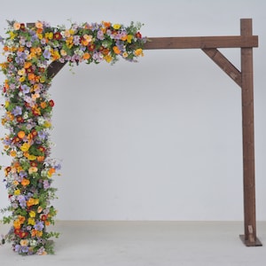 Wildflower Themed Wedding Arch Arrangements in Purple, Orange, Red and Yellow
