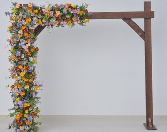 Wildflower Themed Wedding Arch Arrangements in Purple, Orange, Red and Yellow
