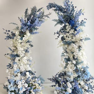 Blue and White Wedding Flower Arrangement with Greenery for Horn Arch