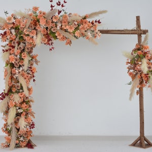 Herbstliche Hochzeit mit Pampas OrangeTerracotta Bogen und Hochzeitspapeterie