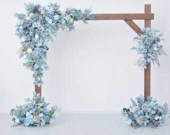 Elegant Blue and White Floral Wedding Arch Arrangement