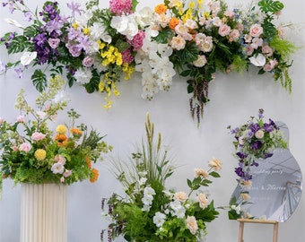 Greenery Wedding Arch Arrangement in Shades of Purple, White, Pink, and Yellow