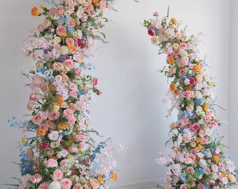 Wedding Floral Arrangement for Horn Arch in Pastel Colors with a Pop of Blue and Orange